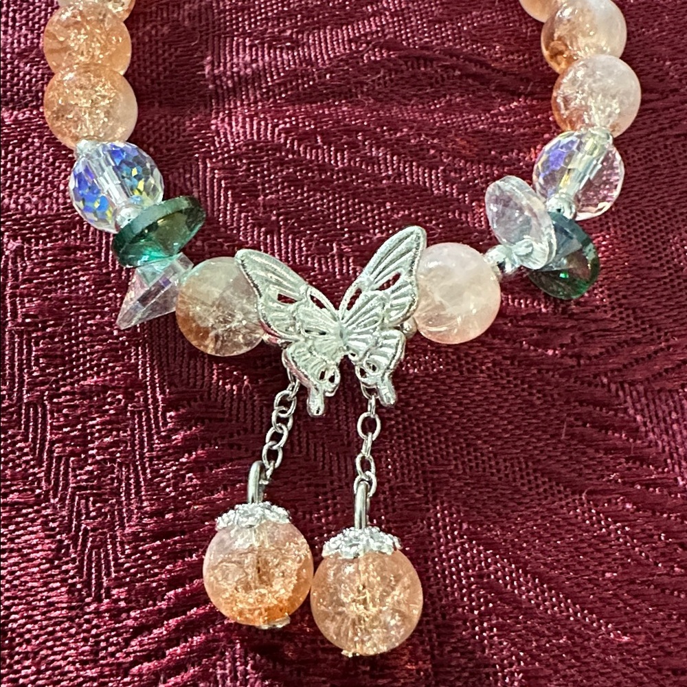 Sweet Clear/Tangerine Glass Bead Bracelet Featuring a Whimsical Butterfly Charm